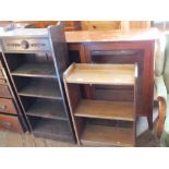 A floor standing two door glazed display cabinet and two vintage bookcases