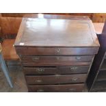 A heavy mahogany bureau with two short drawers,