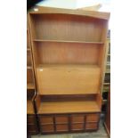 A Nathan teak shelf back drinks cupboard with two door cupboard below