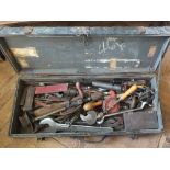 A tool chest containing various large spanners and tools,