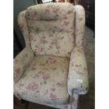 A modern floral upholstered armchair