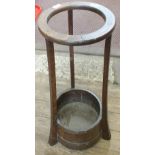 An oak stickstand with barrel form base with maker's mark for Rallister,