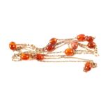 An eleven bead amber style necklace