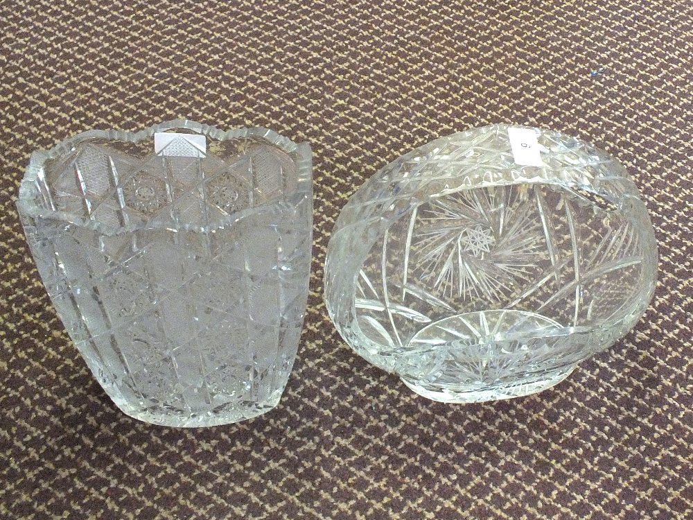 Two heavy cut glass vases and a basket