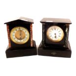 Two black slate mantel clocks