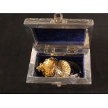 A casket containing silver jewellery plus a gilt pocket watch