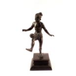 A Burmese bronze figure of a chin-lon player,