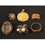 A mixed group including a broken 15ct gold ring, three odd 9ct gold earrings,