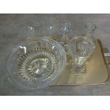 A large quantity of cut glass including vases, decanters,