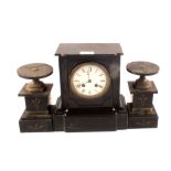 A black marble clock garniture