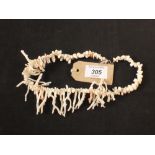 An unusual white coral necklace
