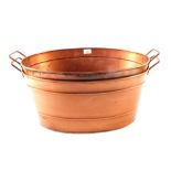 A pair of oval copper planters