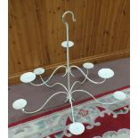 An iron eight branch candelabra