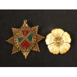 A Danish silver and enamel flower brooch and an enamel star shaped order/brooch