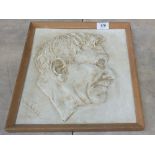 Daphne Webb plaster plaque of Aldous Huxley, signed bottom left,