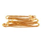 An unmarked gold snake link long guard chain with dog clip clasp
