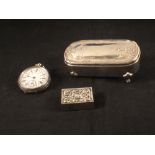 A silver pocket watch,