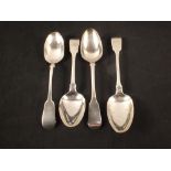 Four silver serving spoons,