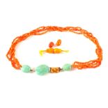 A coral and green stone necklace with unmarked gold clasp plus four pieces of butterscotch amber