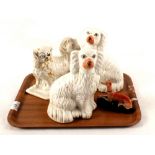 Three Victorian Staffordshire dogs plus a greyhound inkwell