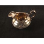 A silver cream jug, Goldsmiths Alliance Ltd, London 1868, mark S.S.