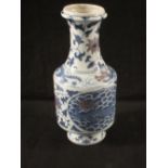 A Chinese blue and white dragon and floral vase
