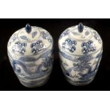 A pair of modern Chinese blue and white lidded jars