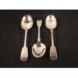 Three silver serving spoons,
