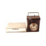 A silver plated engine turned cigarette box plus an Ever Ready wooden lamp