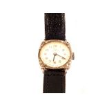 A lady's white metal Record wristwatch with diamond set case