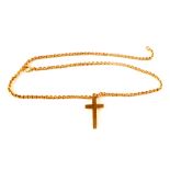 A 9ct gold cross pendant suspended on a gold chain