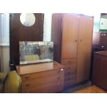 A 1970's teak dressing table and combination wardrobe