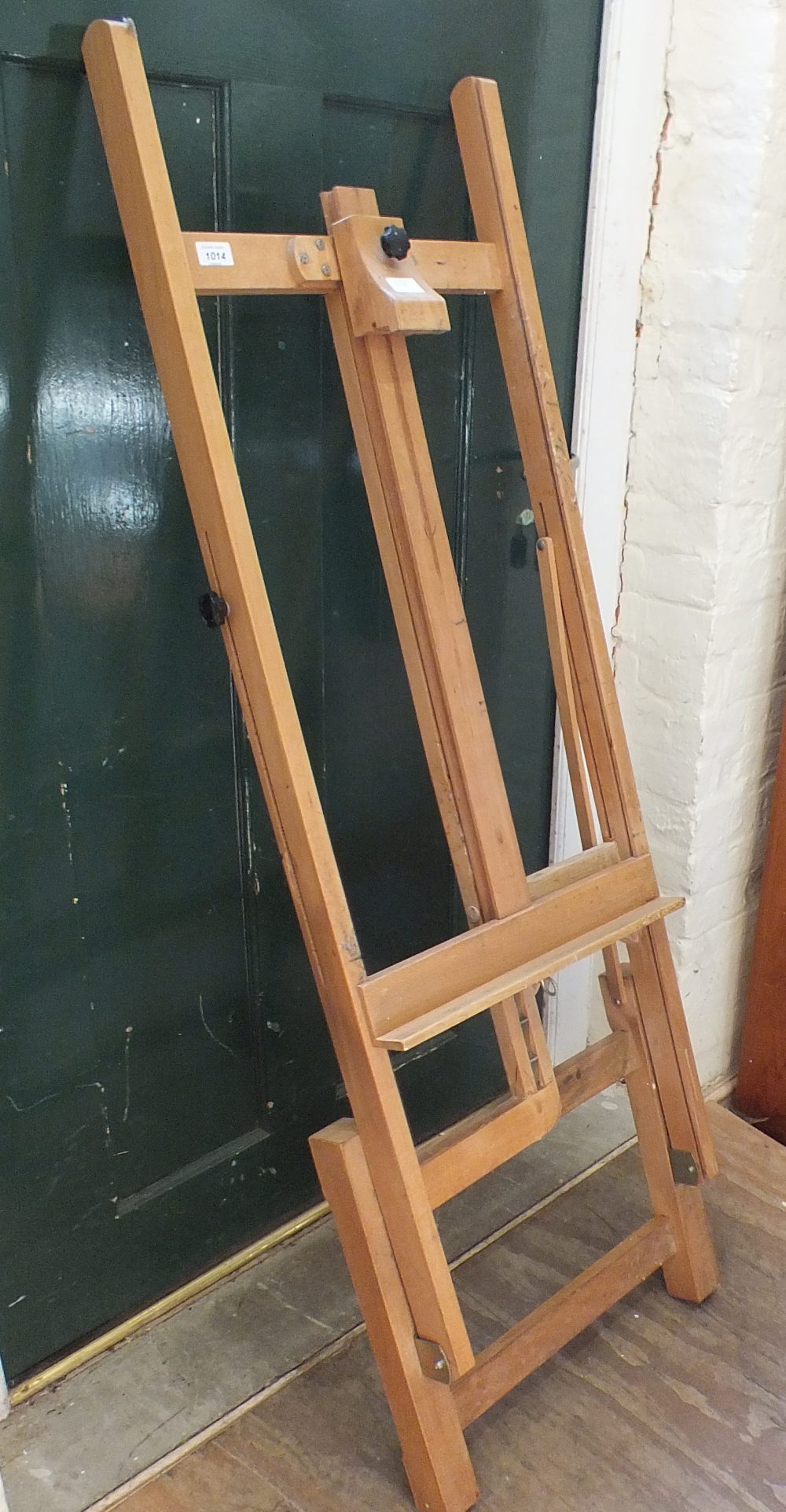 A large wooden artist's easel