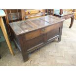 An 18th Century coffer of small proportions with fitted candle box