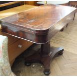 A Victorian mahogany card table on hexagonal column quatrefoil base