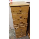 A pair of modern bedside chest of three drawers