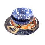 A 19th Century Imari plate plus blue and white Japanese bowls and plate