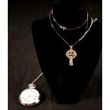 A silver Celtic cross on a silver chain with an Ingersoll pocket watch.