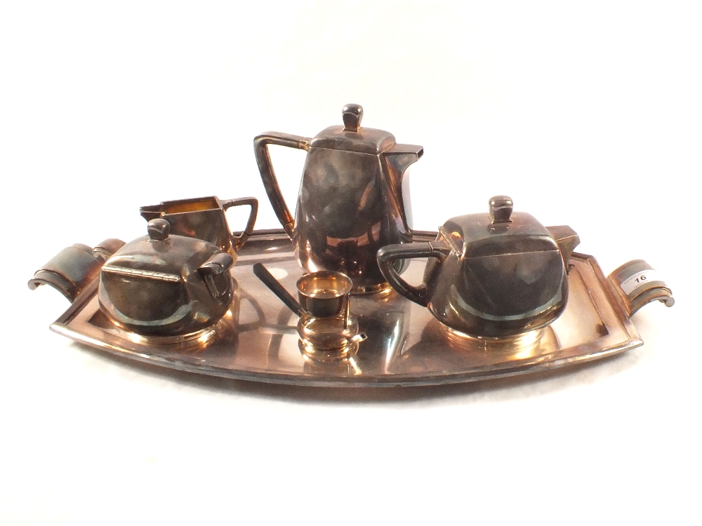 An Art Deco silver plated four piece tea set and tray by Wiskemann