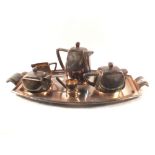 An Art Deco silver plated four piece tea set and tray by Wiskemann