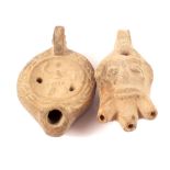 Two Roman pottery oil lamps