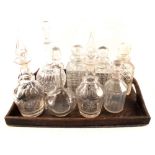 Nine various cut and etched glass decanters