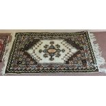 A Persian style brown ground rug,