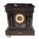 A black slate and marble column mantel clock with enamel dial