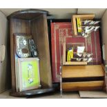 A brass mounted expanding book rack and various bookends, a simulated book box plus unmarked No.