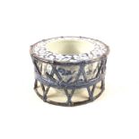 A Chinese blue and white bowl with reticulated outer shell,