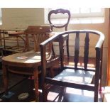 Two elbow chairs and a dining chair