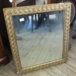 A modern rectangular gilt framed wall mirror