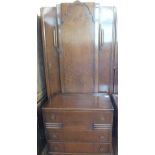 A vintage single door wardrobe and matching chest of three long drawers