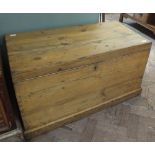 A Victorian pine blanket box with fitted interior candle box